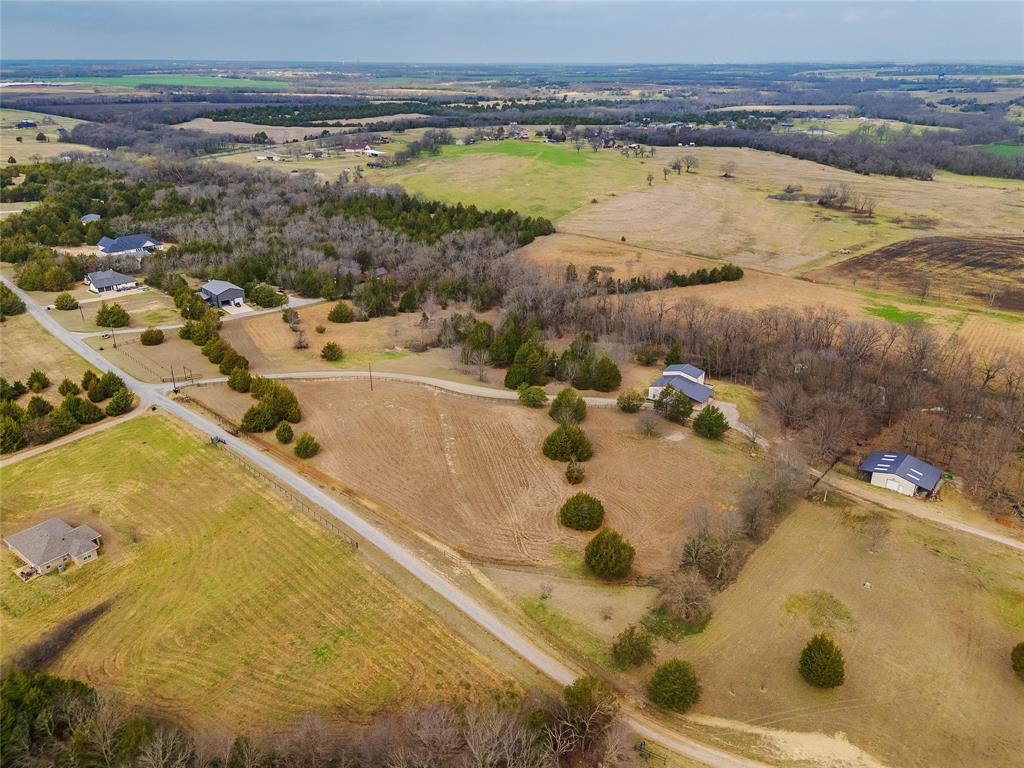 1878 North Lincoln Park Road Van Alstyne, TX 75495 - Photo 31 of 32 a view of a swimming pool and an outdoor space