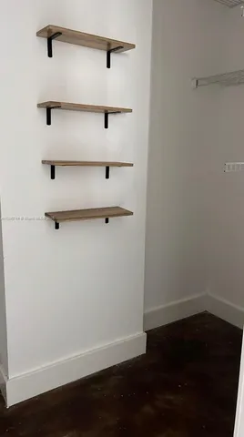 a view of a yard with an ocean view