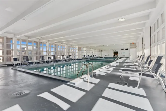a view of a balcony with chairs