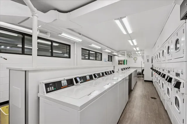 a kitchen with stainless steel appliances lots of counter top space