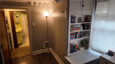 a view of a hallway with closet