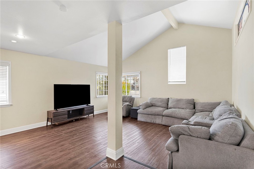 1087 Baseline Road La Verne, CA 91750 - Photo 9 of 39 a living room with furniture and a flat screen tv