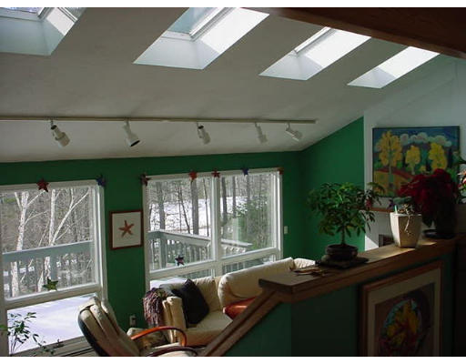 12 Uplands Road Littleton, MA 01460 - Photo 2 of 6 a living room with furniture and a large window
