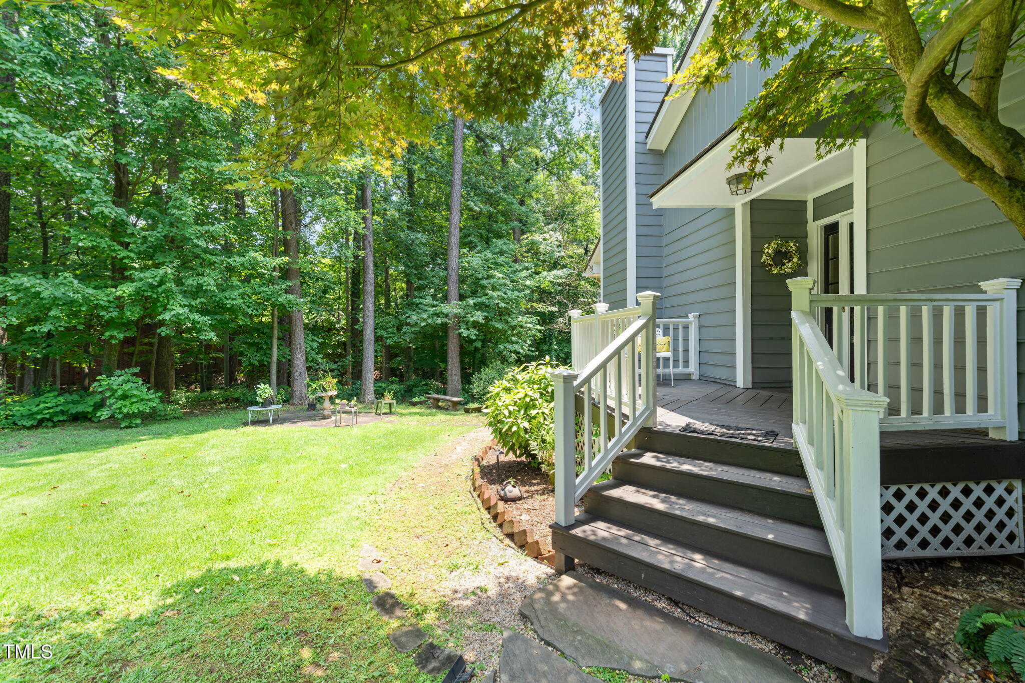 2849 Rue Sans Famille Raleigh, NC 27607 - Photo 2 of 51 a view of a house with backyard and deck