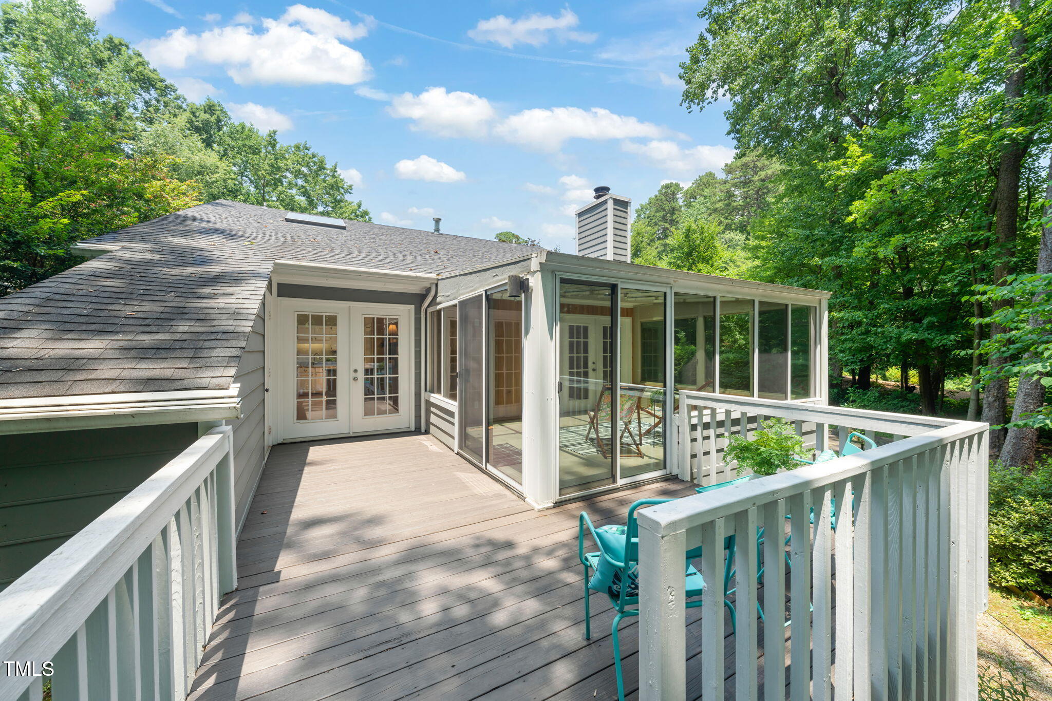 2849 Rue Sans Famille Raleigh, NC 27607 - Photo 32 of 51 a view of house with wooden deck and outdoor space