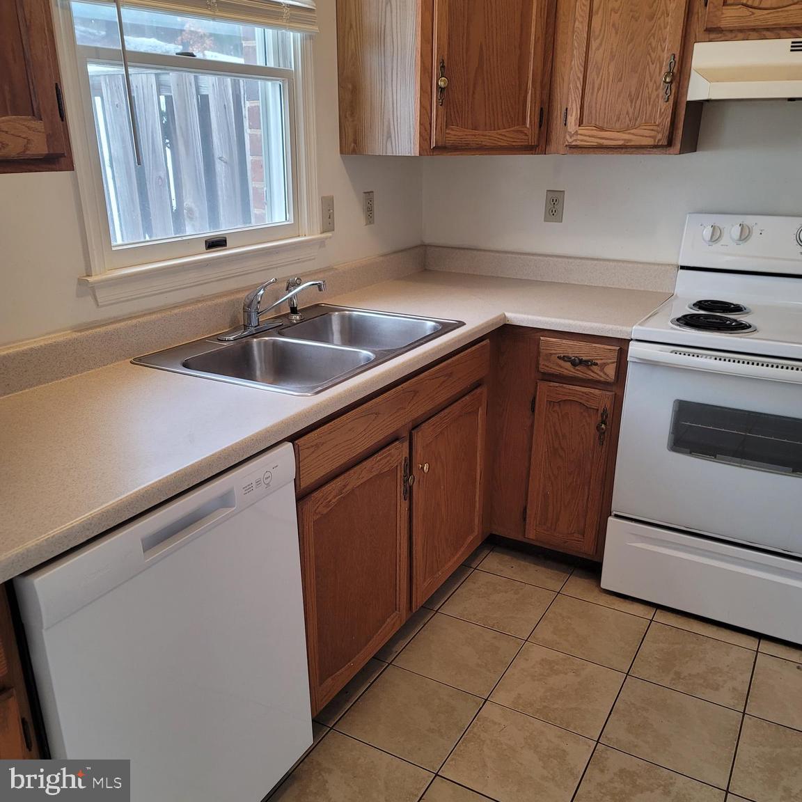 71 Leatherman Drive Falling Waters, WV 25419 - Photo 4 of 22 a kitchen with a sink cabinets and appliances