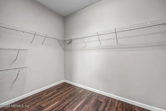 a view of a room with racks on the wall