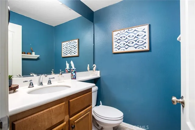 a work room with furniture and wooden floor