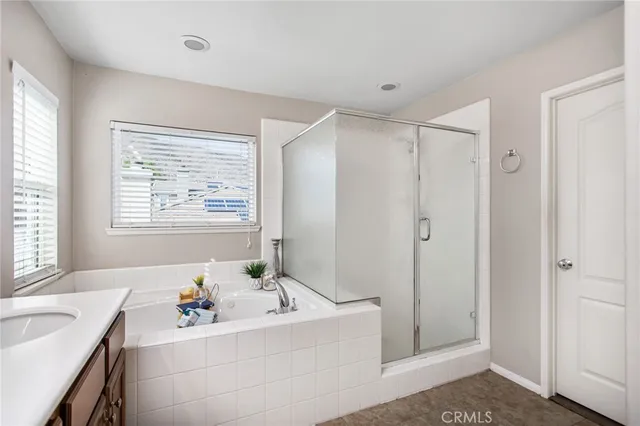 a view of backyard with swimming pool and outdoor seating