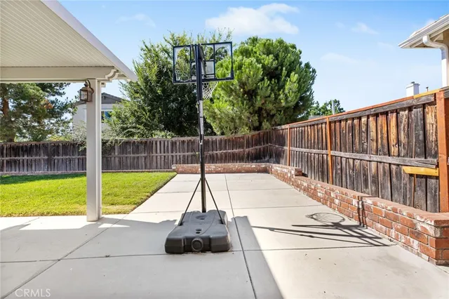 an aerial view of residential house with outdoor space