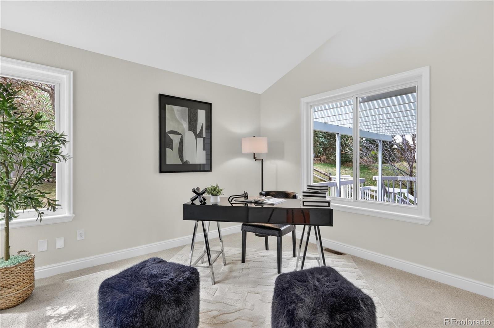 2445 East Lansdowne Court Highlands Ranch, CO 80126 - Photo 20 of 49 a livingroom with furniture and a window