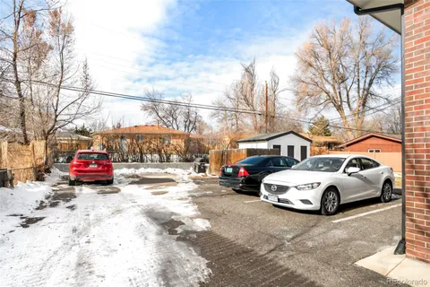 a view of a cars parked in front of a house