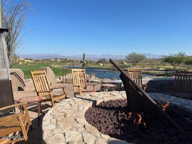 a view of a building with sitting area
