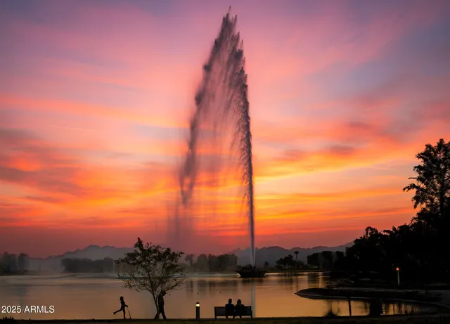a view of swimming pool from a balcony