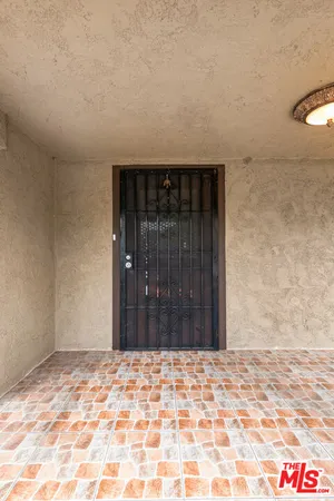wooden floor in a hall with an entryway