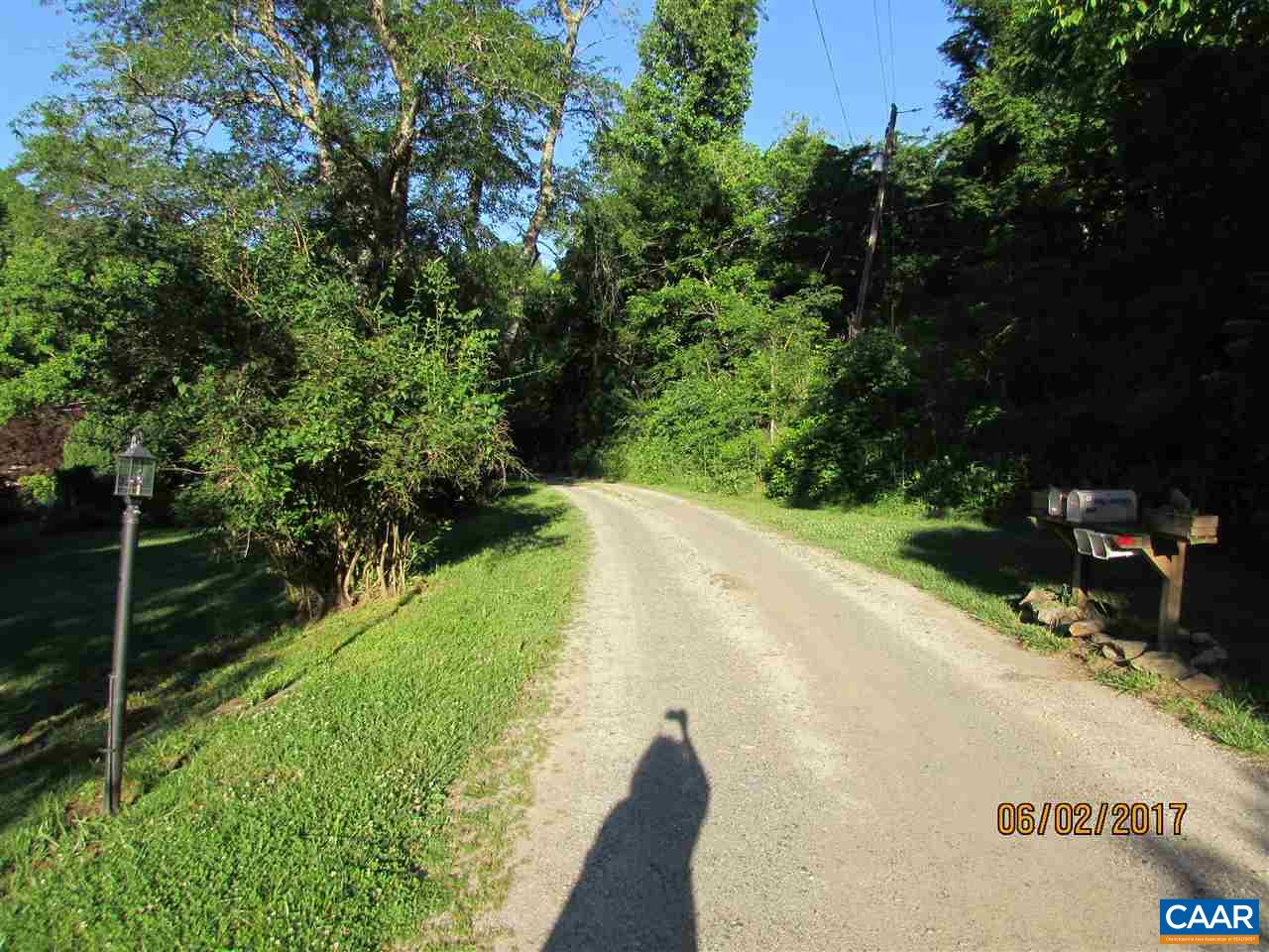 668 Peters Hollow Road Monroe, VA 24574 - Photo 23 of 50 a view of a street with a yard