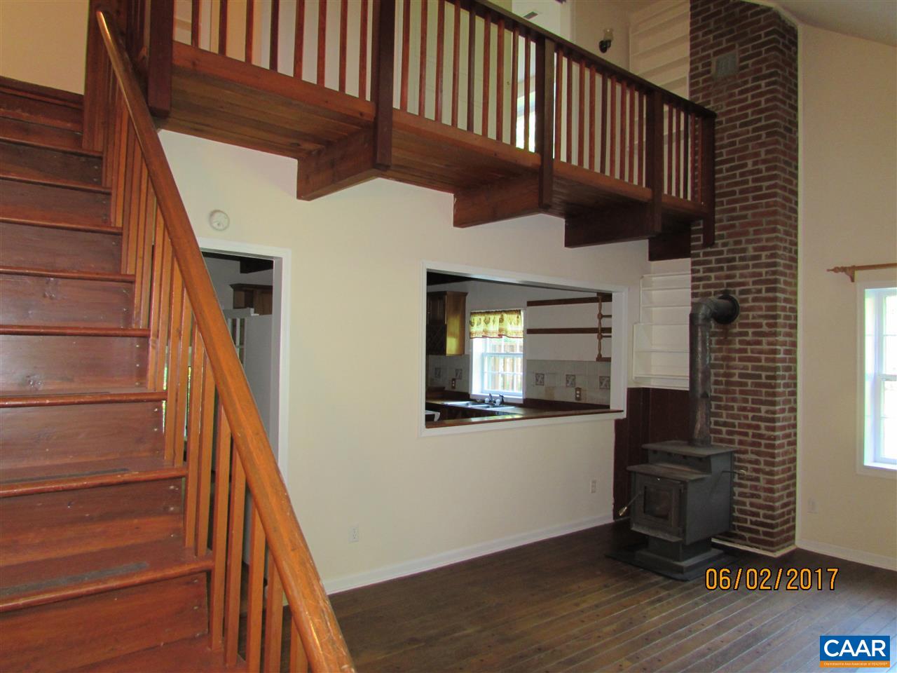 668 Peters Hollow Road Monroe, VA 24574 - Photo 28 of 50 a view of an entryway with wooden floor and staircase