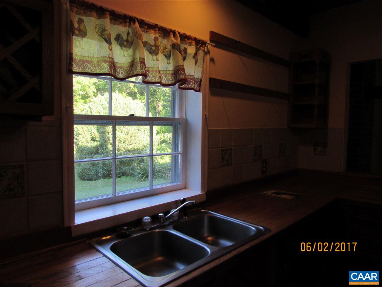 668 Peters Hollow Road Monroe, VA 24574 - Photo 33 of 50 a close view of a sink a counter space and a window