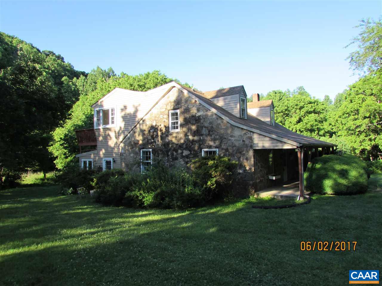 668 Peters Hollow Road Monroe, VA 24574 - Photo 5 of 50 a front view of a house with garden