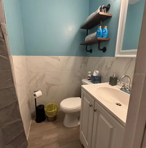 a bathroom with a sink and a toilet