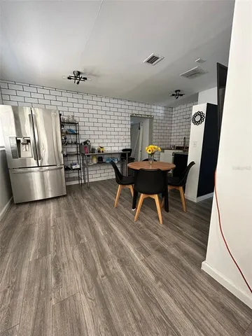 a workspace with wooden floor