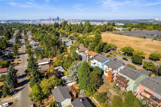 an aerial view of residential building with outdoor space