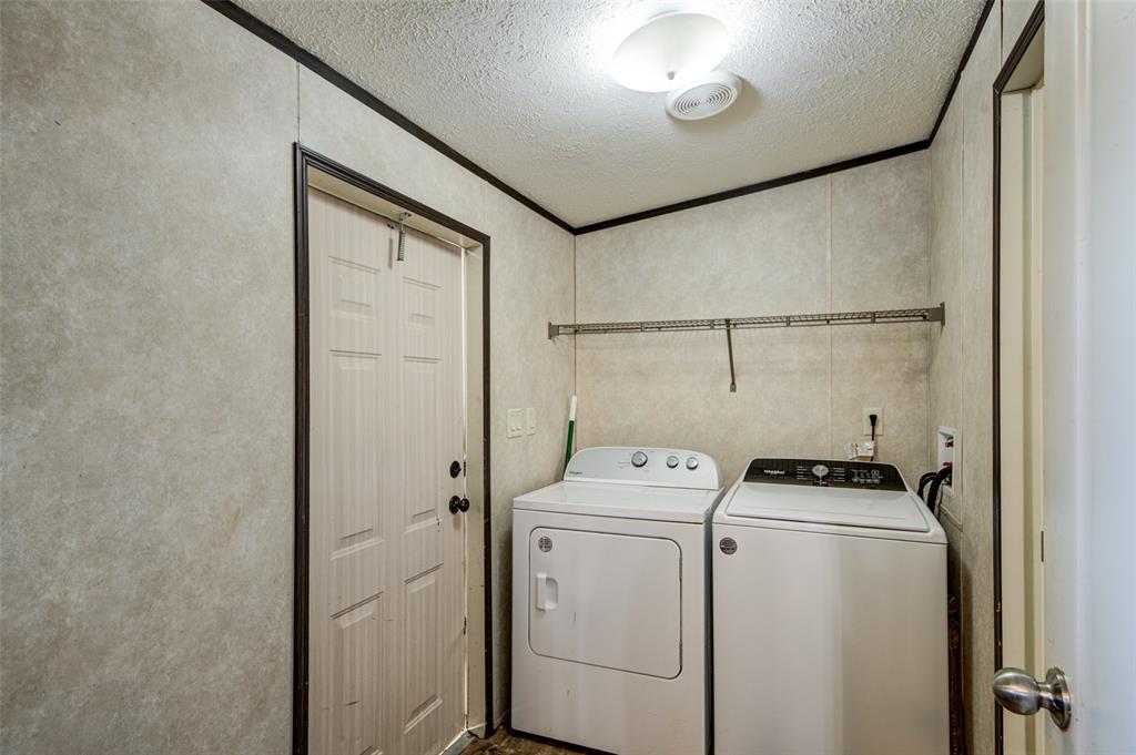 1420 County Road 4522 Decatur, TX 76234 - Photo 23 of 24 a utility room with dryer and washer