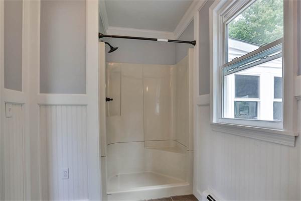 331 Pelham Street Methuen, MA 01844 - Photo 14 of 27 a bathroom with a glass shower door