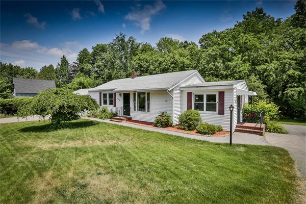331 Pelham Street Methuen, MA 01844 - Photo 21 of 27 a front view of a house with a yard