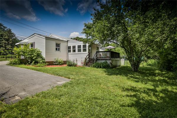 331 Pelham Street Methuen, MA 01844 - Photo 25 of 27 a front view of a house with a yard