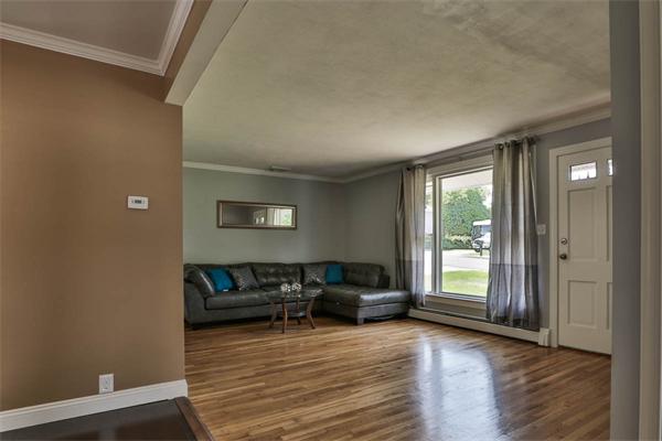 331 Pelham Street Methuen, MA 01844 - Photo 6 of 27 a living room with furniture and a window