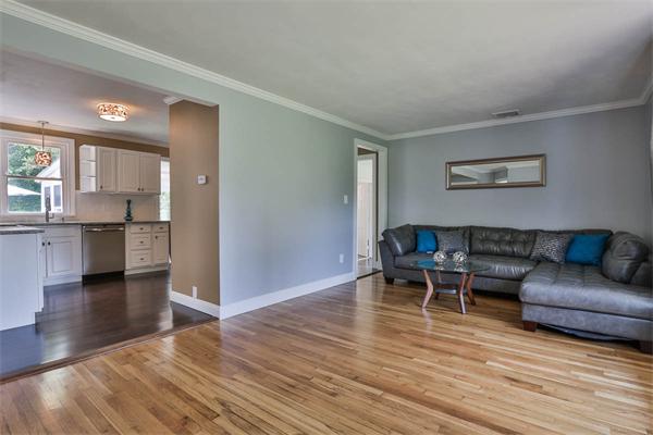 331 Pelham Street Methuen, MA 01844 - Photo 7 of 27 a living room with furniture and a wooden floor