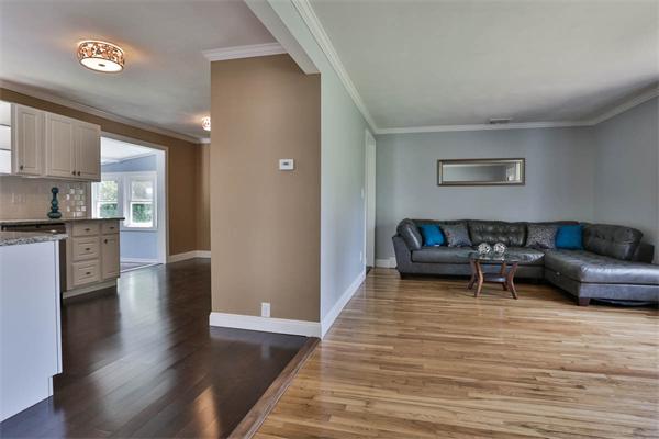 331 Pelham Street Methuen, MA 01844 - Photo 9 of 27 a living room with furniture and a wooden floor