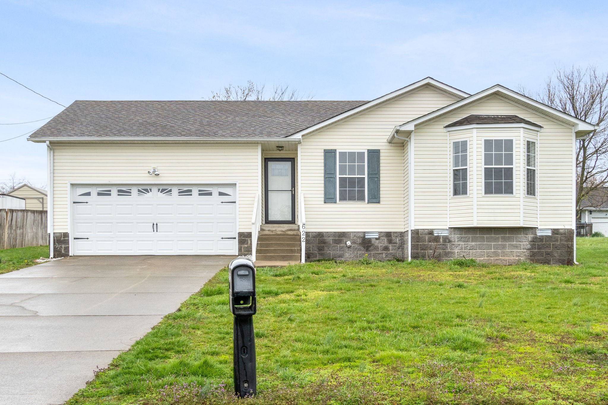 622 Avondale Road Oak Grove, KY 42262 - Photo 1 of 29 a front view of a house with a yard and garage