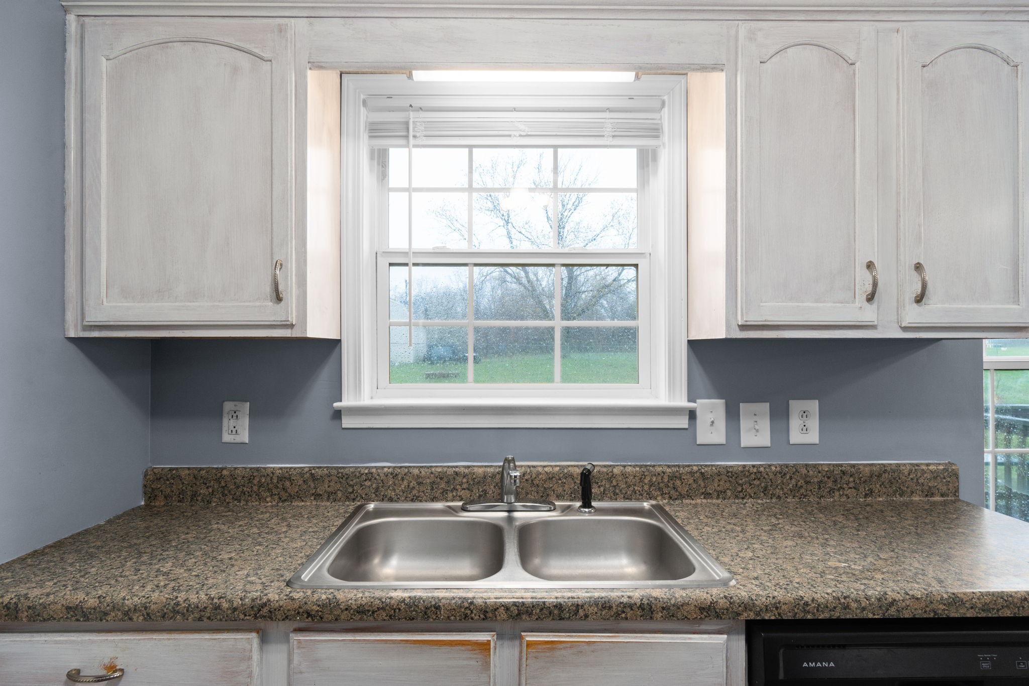 622 Avondale Road Oak Grove, KY 42262 - Photo 14 of 29 a kitchen with granite countertop white cabinets and a sink