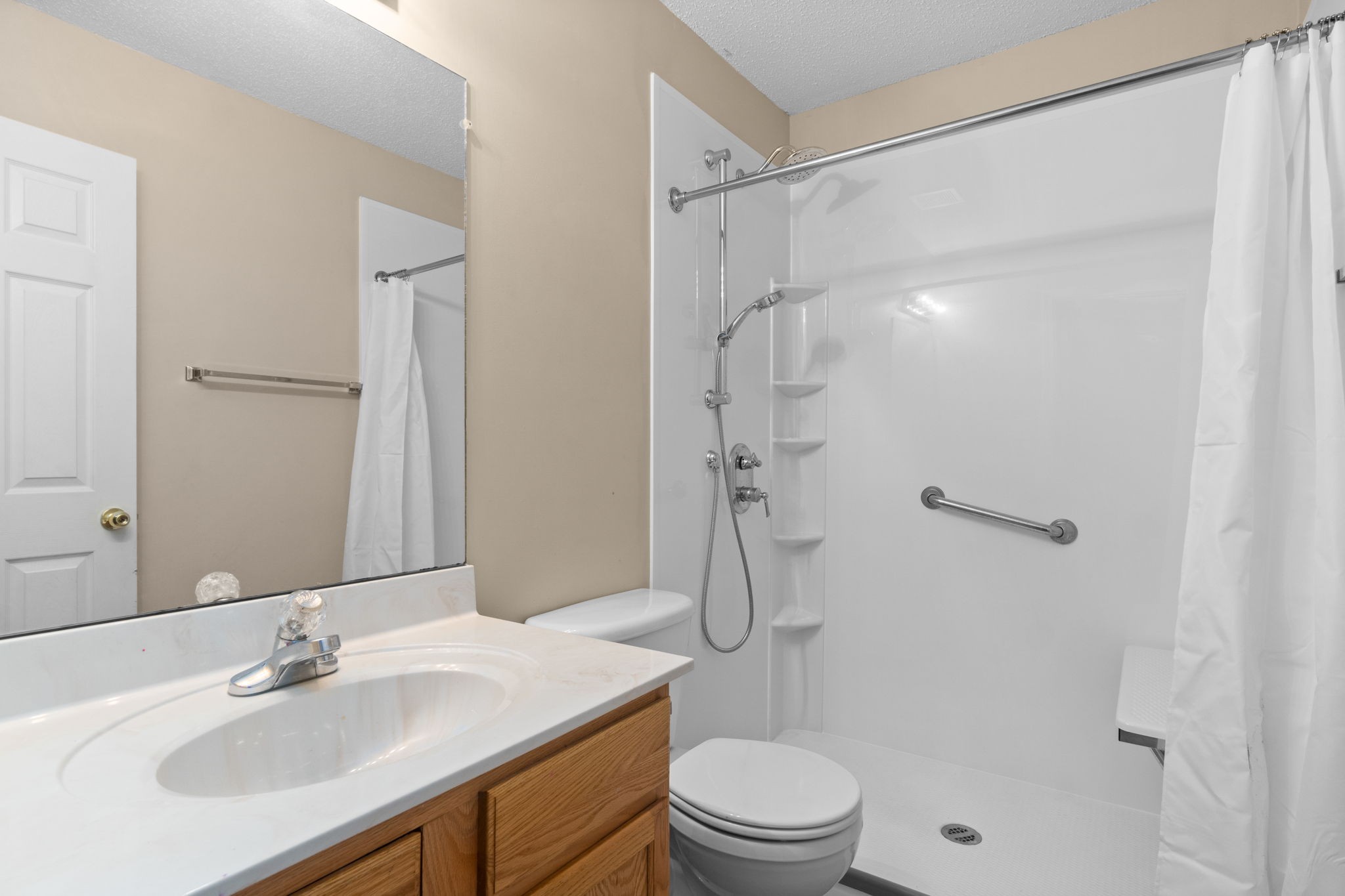 622 Avondale Road Oak Grove, KY 42262 - Photo 18 of 29 a bathroom with a sink toilet and shower