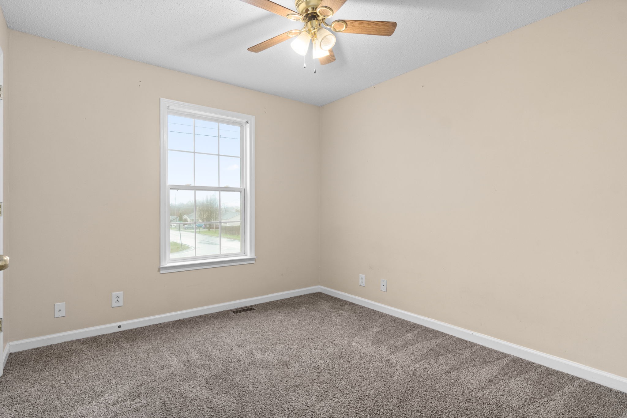 622 Avondale Road Oak Grove, KY 42262 - Photo 19 of 29 an empty room with a window and a fan