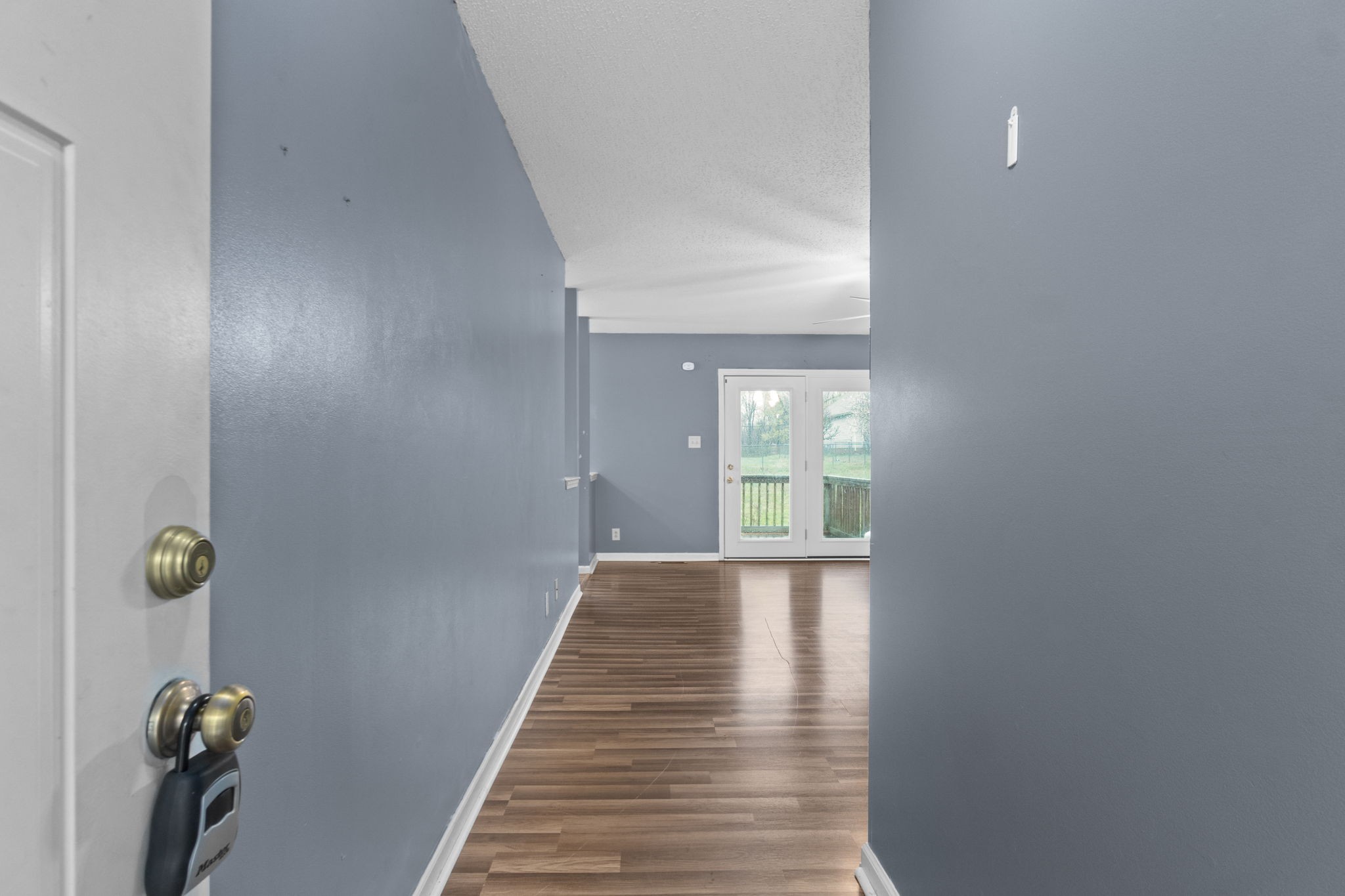 622 Avondale Road Oak Grove, KY 42262 - Photo 5 of 29 a view of a room with wooden floor and windows