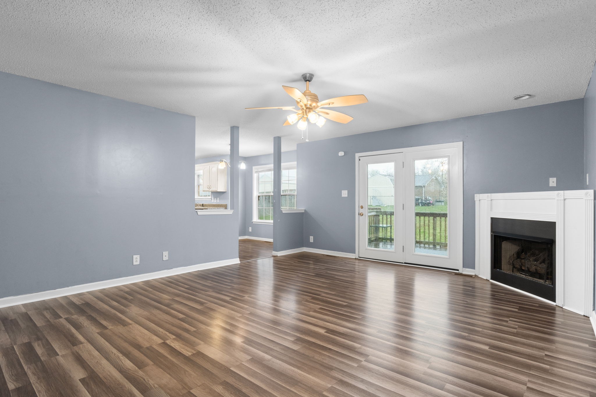 622 Avondale Road Oak Grove, KY 42262 - Photo 7 of 29 a view of an empty room with window and wooden floor