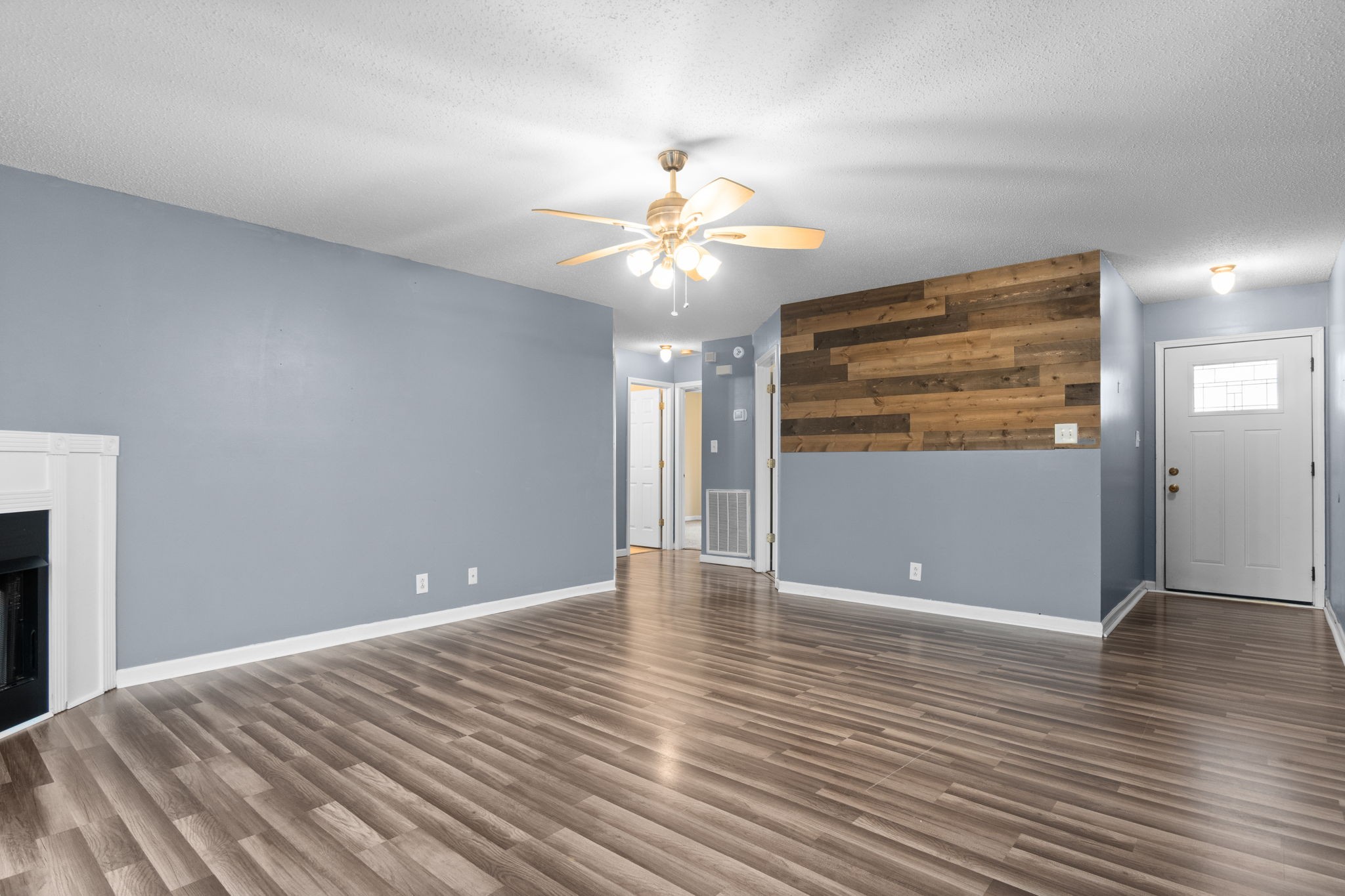 622 Avondale Road Oak Grove, KY 42262 - Photo 9 of 29 a view of an empty room with window and wooden floor