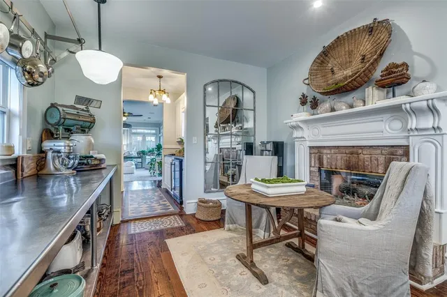 a view of a livingroom with furniture and a fireplace
