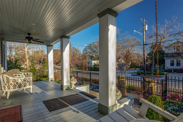 a balcony with wooden floor