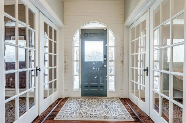 front view of an entryway with a rug