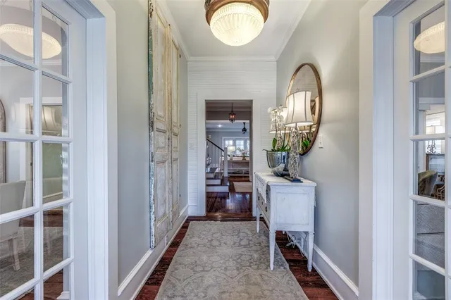 a view of a livingroom with furniture and wooden floor