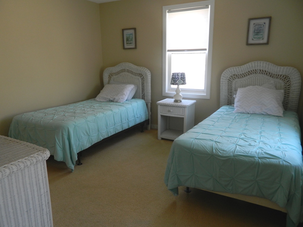 78 Old Purchase Road Edgartown, MA 02539 - Photo 14 of 17 a bedroom with a bed and a window