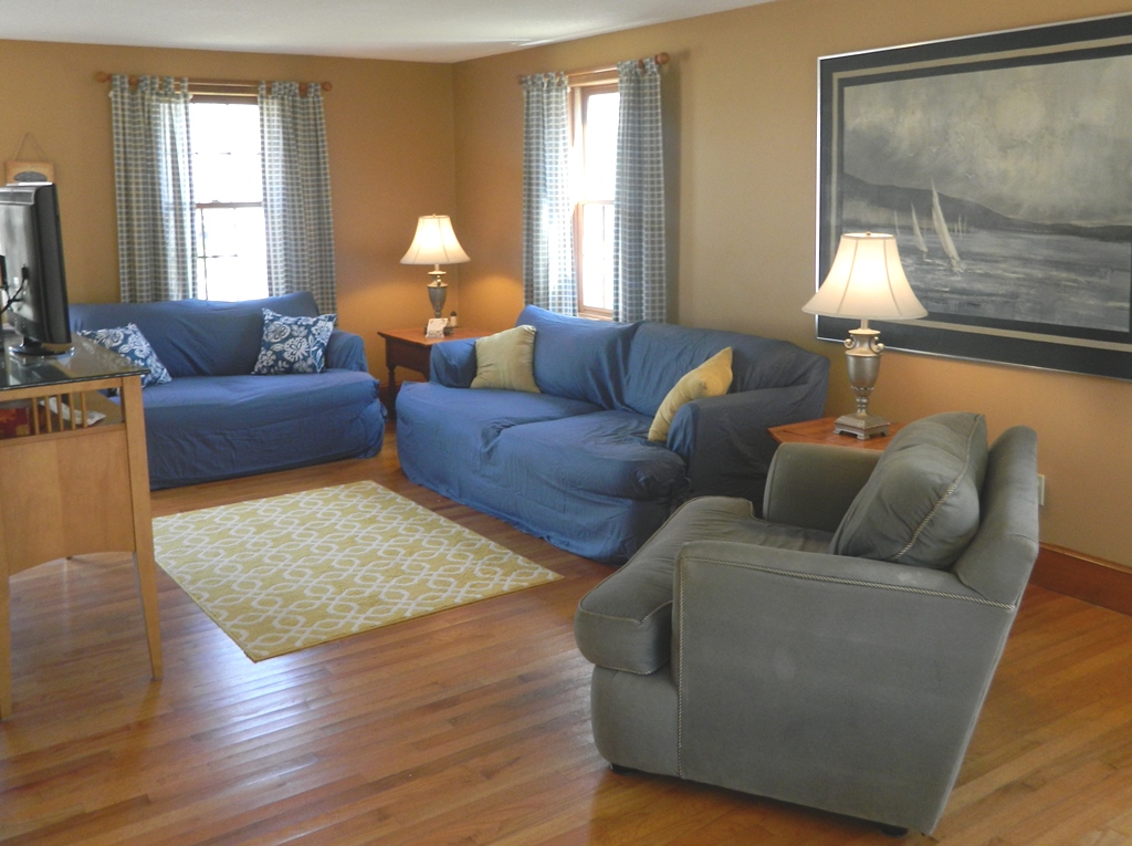 78 Old Purchase Road Edgartown, MA 02539 - Photo 9 of 17 a living room with furniture and a lamp