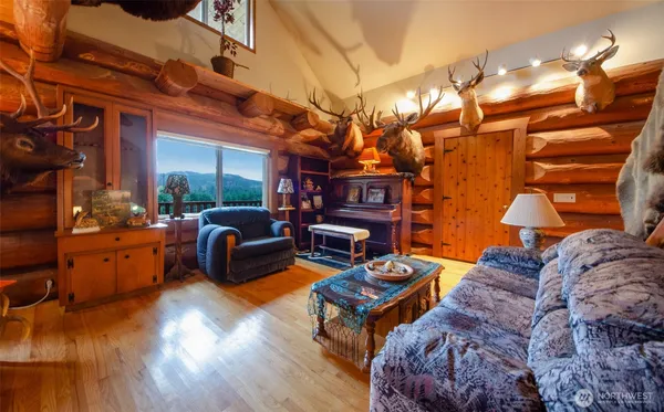 a view of a couches with wooden floor