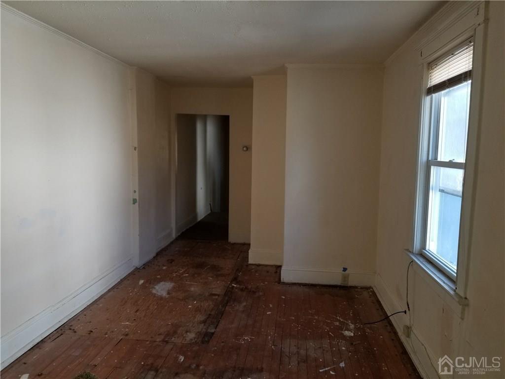 110 Rector Street Perth Amboy, NJ 08861 - Photo 14 of 15 a view of an empty room with a window