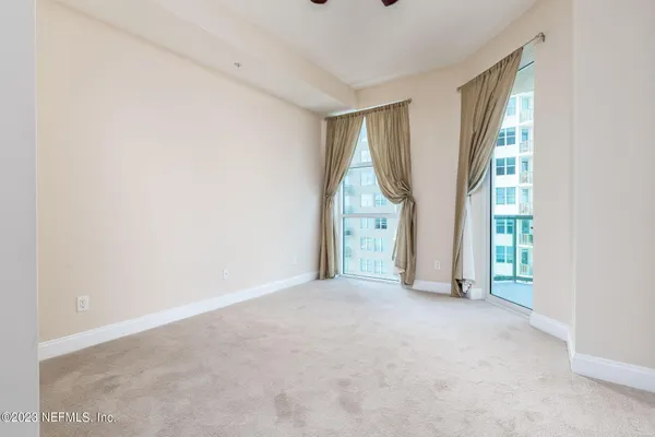 an empty room with windows