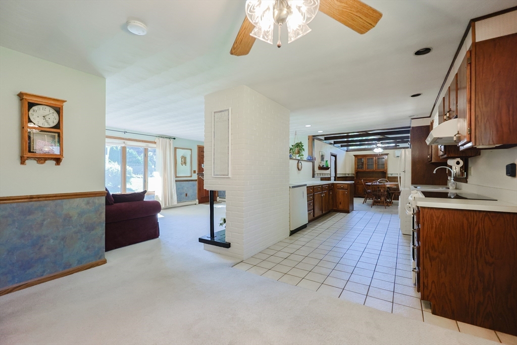 18 Paxton Road Framingham, MA 01701 - Photo 11 of 37 a living room with furniture and a flat screen tv